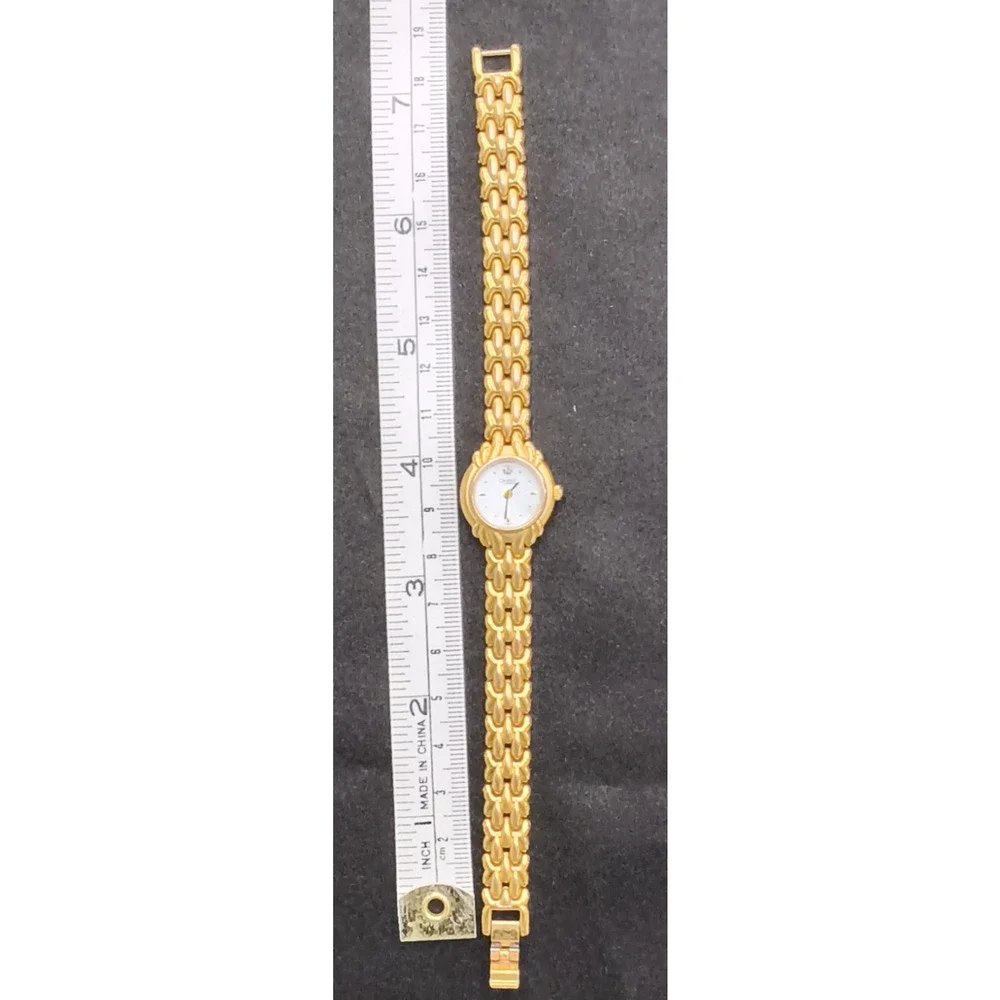 Caravelle by Bulova 44P07 women's Watch Gold Tone Round White Face #W5153
